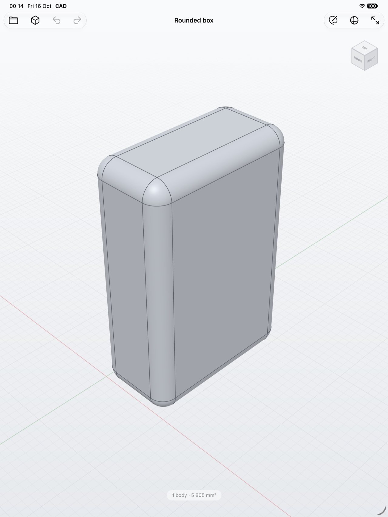 CADsmith on iPad showing a solid box with filleted edges on a grid, with a view cube in the corner